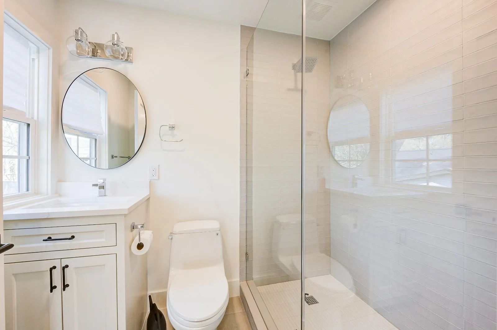 Marble bathroom with frameless glass and brushed nickel fittings in Carlton Woods, The Woodlands, TX