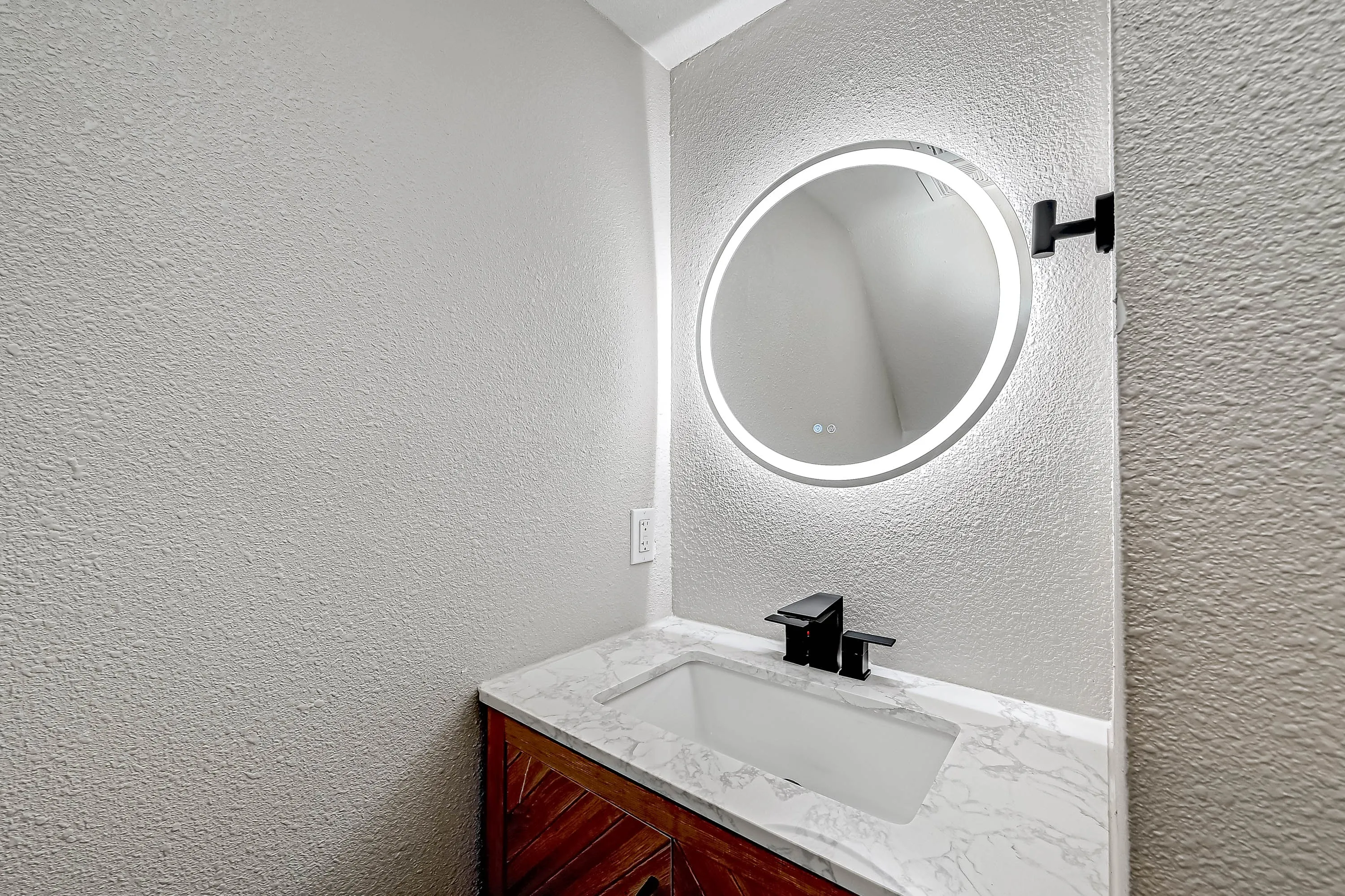Whole home renovation of a mid-century house with a new kitchen and stair in The Woodlands, TX