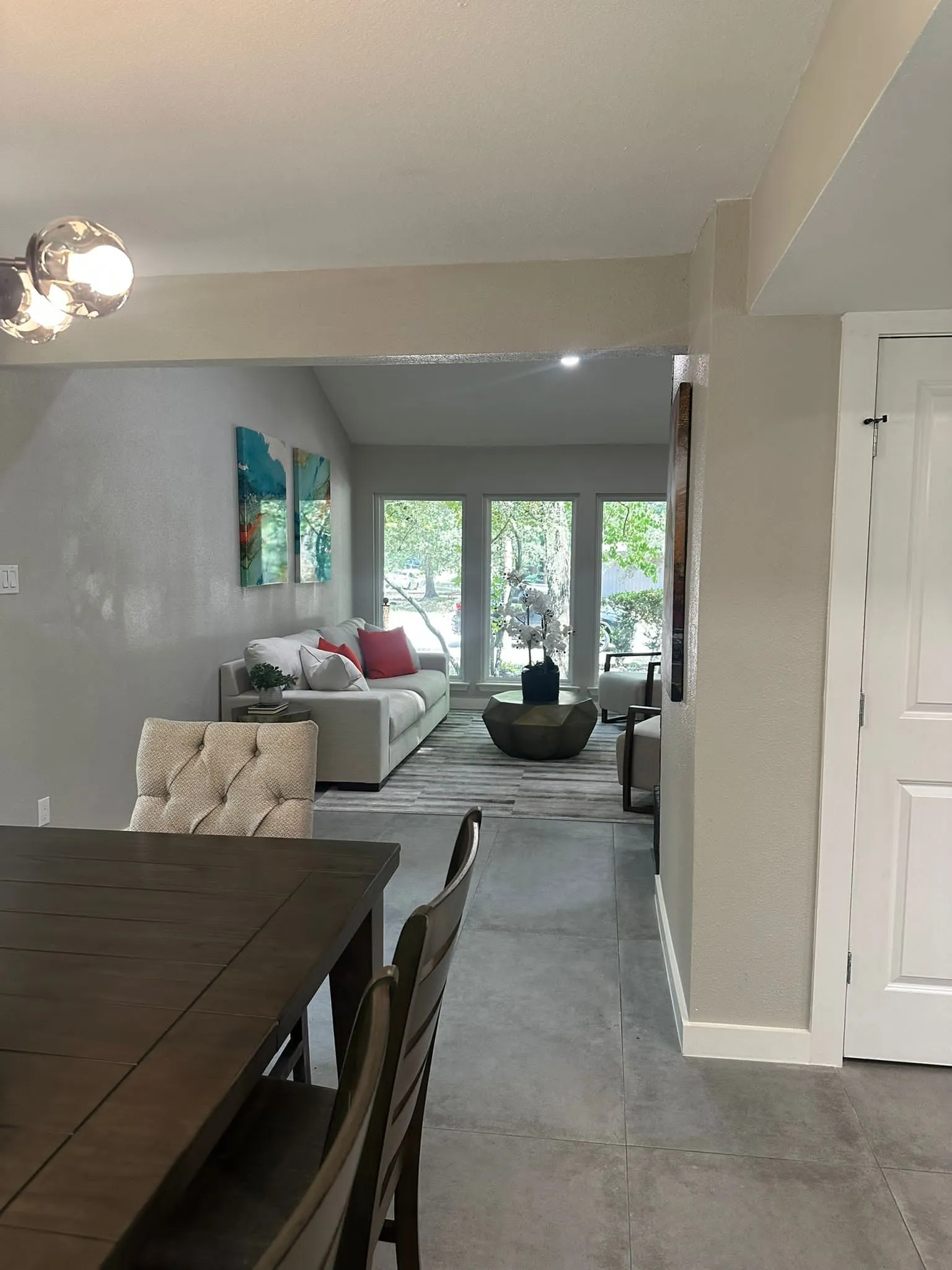 Whole home renovation of a mid-century house with a new kitchen and stair in The Woodlands, TX