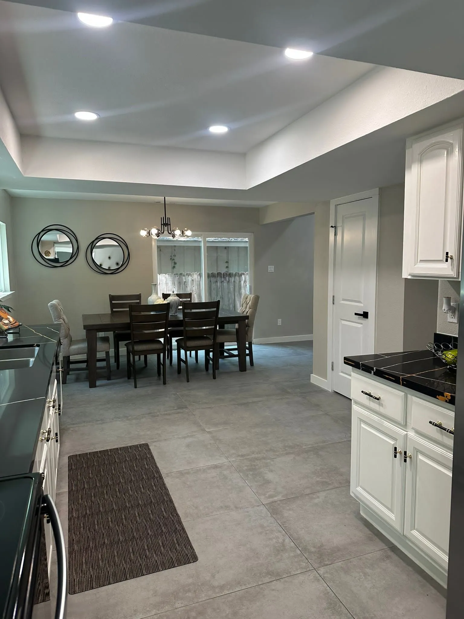Whole home renovation of a mid-century house with a new kitchen and stair in The Woodlands, TX