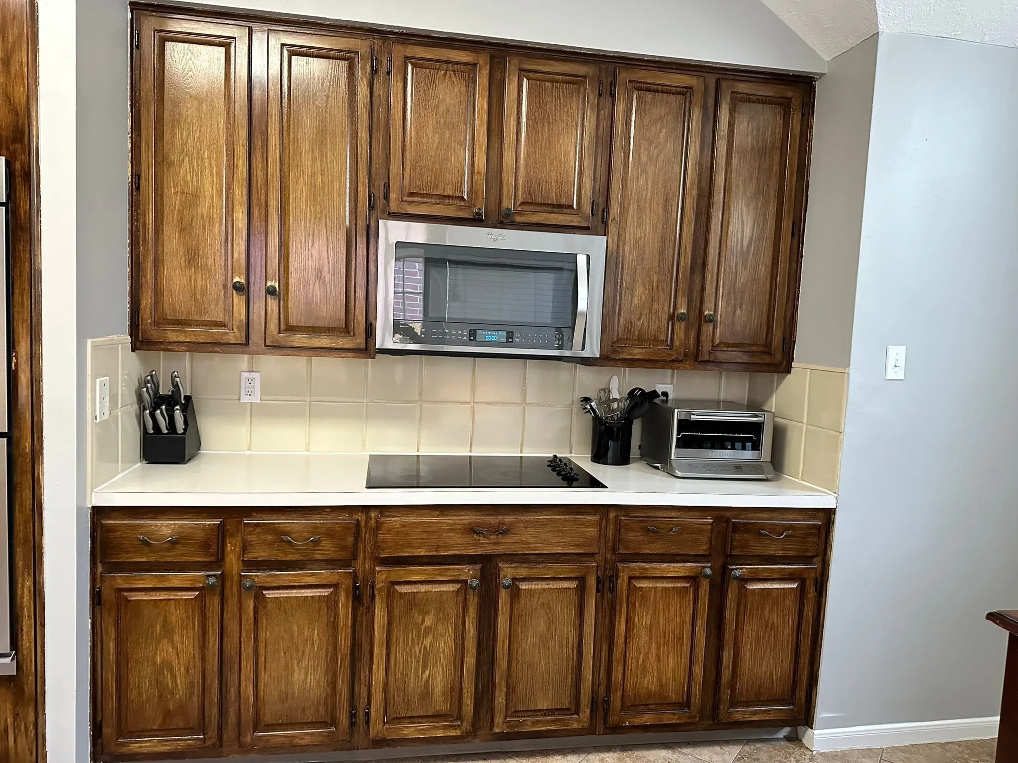 Whole home renovation with new plank flooring and arched windows in Panther Creek, The Woodlands, TX