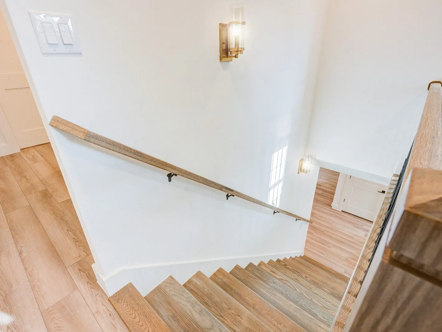 White oak stair, handrail, and trim built during a whole home renovation in The Woodlands, TX